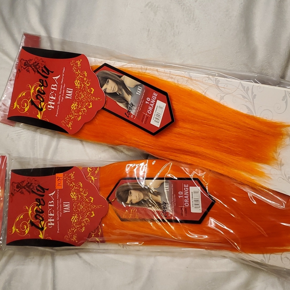 2 packs of orange weave Lovely Heba Yaki human natural hair. 10"